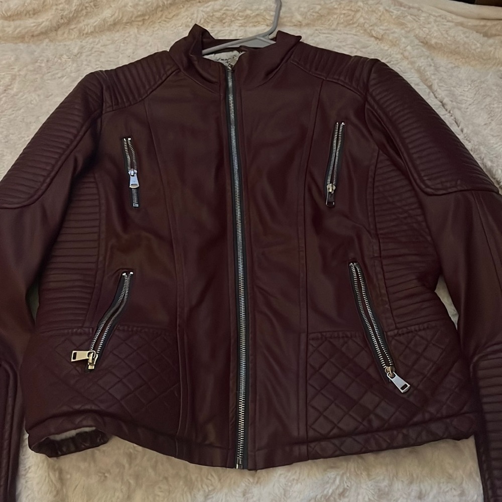 Women’s size large leather jacket with fuzzy insulation